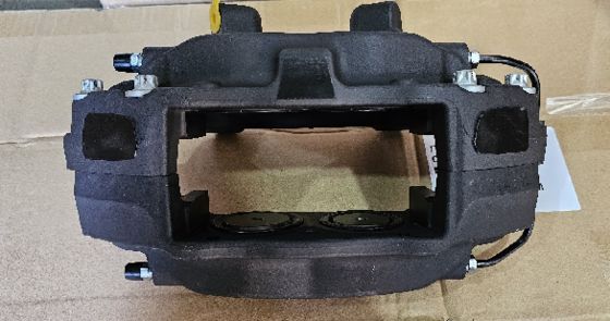 Tesla Model S/X linker voorremklem 1007794-00-C 2012-2021